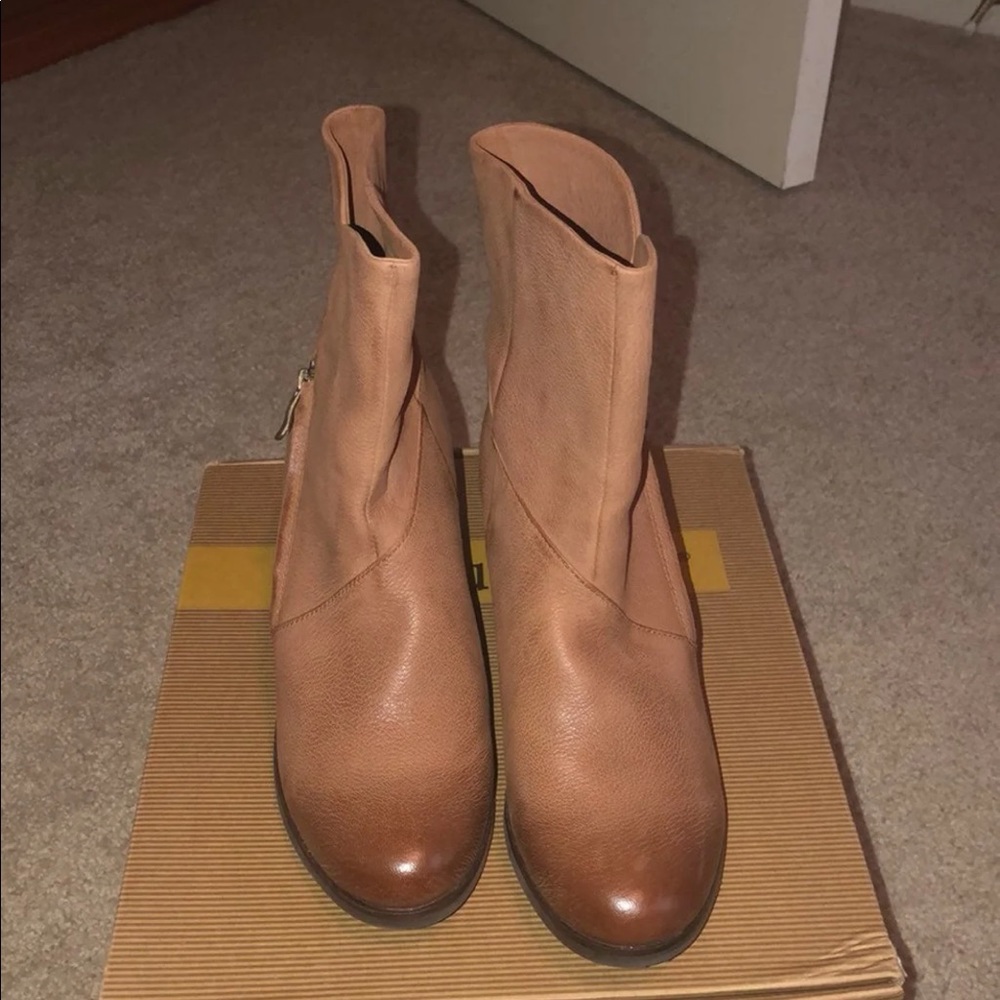 Boots. Never been worn